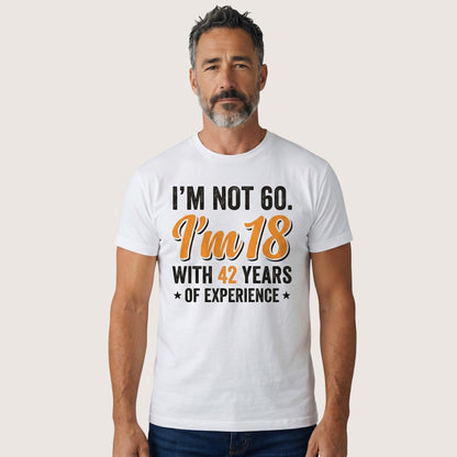 TrendyShift.Com white cotton t-shirt with I’m not 60 I’m 18 with 42 years of experience quote on a man