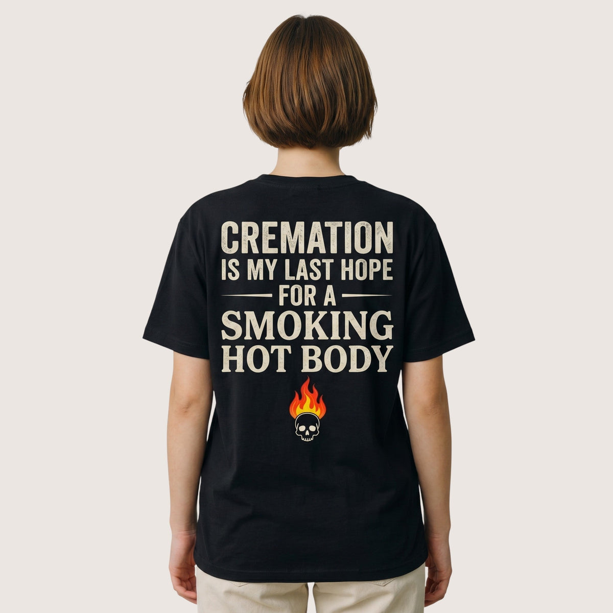 TrendyShift.Com black unisex cotton t-shirt with back graphic print featuring a skull, flame, and dark humor quote.